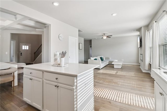 4172 Cedar Commons Way, Conley, GA 30288 - kitchen featuring healthy amount of natural light, open floor plan, ceiling fan, recessed lighting, and light countertops