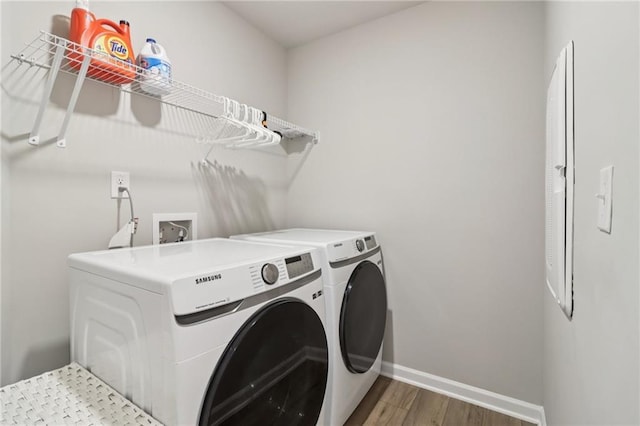 4172 Cedar Commons Way, Conley, GA 30288 - washroom featuring independent washer and dryer, wood finished floors, and baseboards