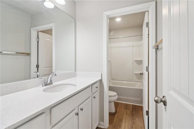 4172 Cedar Commons Way, Conley, GA 30288 - bathroom featuring vanity, toilet, wood finished floors, shower / bath combination, and recessed lighting