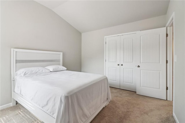 4172 Cedar Commons Way, Conley, GA 30288 - bedroom featuring carpet floors, vaulted ceiling, and a closet