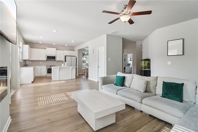 4172 Cedar Commons Way, Conley, GA 30288 - living area featuring a ceiling fan, light wood-type flooring, baseboards, and recessed lighting