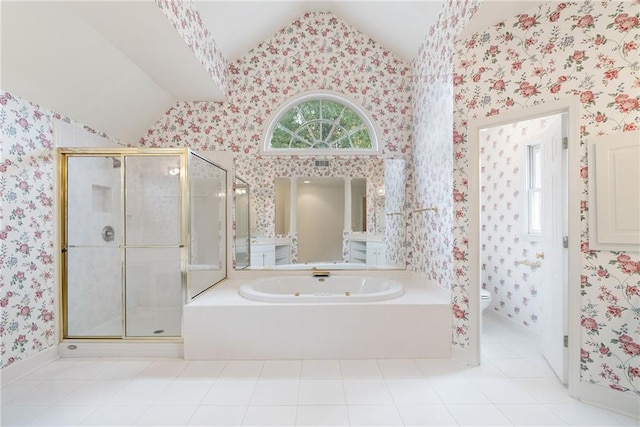 bathroom featuring tile patterned flooring, separate shower and tub, toilet, and lofted ceiling