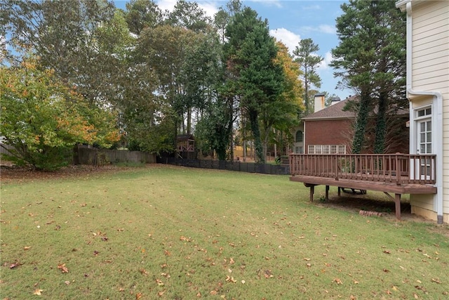 view of yard featuring a deck