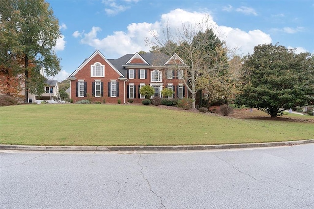 view of front of property featuring a front yard