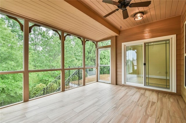 6714 Amherst Dr, Hoschton, GA 30548 - unfurnished sunroom with a ceiling fan, healthy amount of natural light, wood ceiling, wood walls, and wood finished floors
