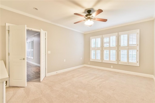 6714 Amherst Dr, Hoschton, GA 30548 - empty room with light colored carpet, crown molding, ceiling fan, and baseboards