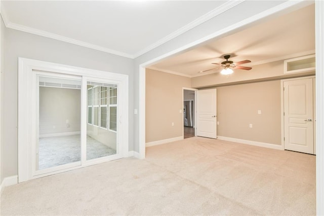 6714 Amherst Dr, Hoschton, GA 30548 - empty room featuring light colored carpet, ornamental molding, ceiling fan, and baseboards