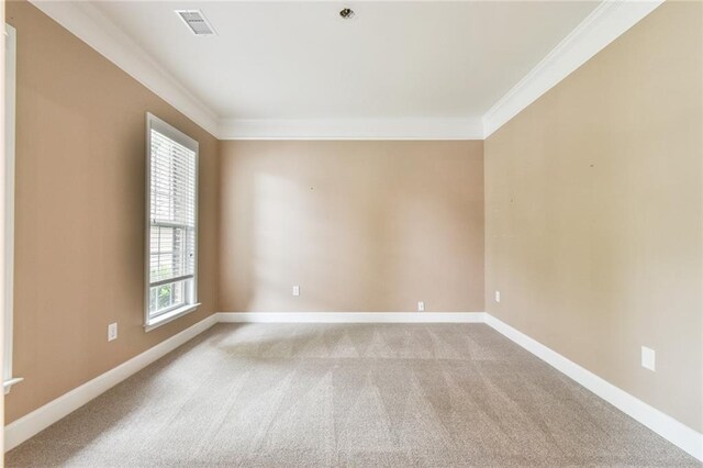 6714 Amherst Dr, Hoschton, GA 30548 - spare room featuring crown molding, light carpet, and baseboards