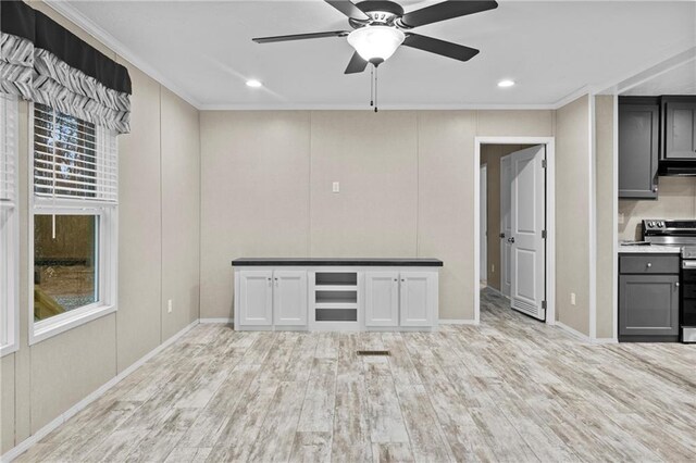 150 Saphire Hill Ct, Clarkesville, GA 30523 - kitchen with electric range, wood finished floors, ceiling fan, crown molding, and exhaust hood