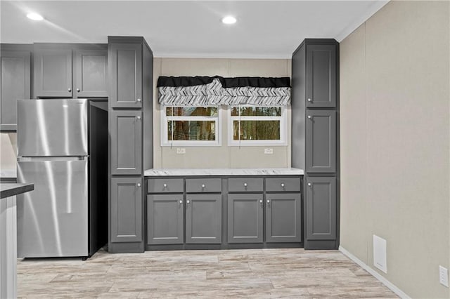 150 Saphire Hill Ct, Clarkesville, GA 30523 - kitchen featuring freestanding refrigerator, gray cabinets, recessed lighting, light wood-style flooring, and baseboards