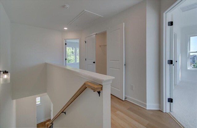 1915 Deco Dr, Kennesaw, GA 30144 - corridor featuring an upstairs landing, light wood-style flooring, attic access, and recessed lighting