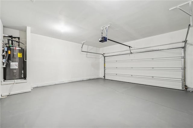 31 Mccall Way, Monroe, GA 30655 - garage with water heater and a garage door opener