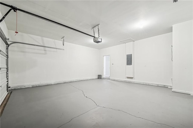 31 Mccall Way, Monroe, GA 30655 - garage with electric panel and a garage door opener