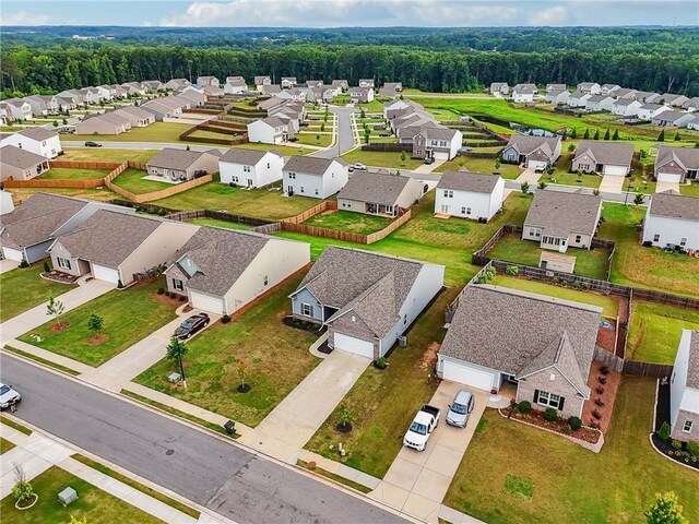 31 Mccall Way, Monroe, GA 30655 - aerial view of residential area featuring a heavily wooded area