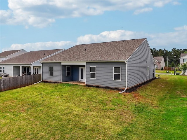 31 Mccall Way, Monroe, GA 30655 - rear view of house with roof with shingles and a patio