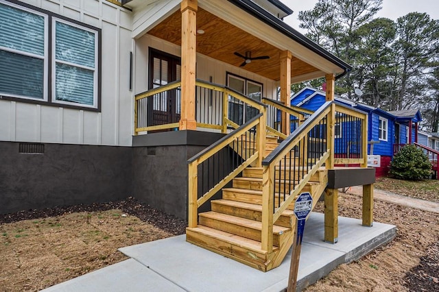 view of exterior entry with ceiling fan