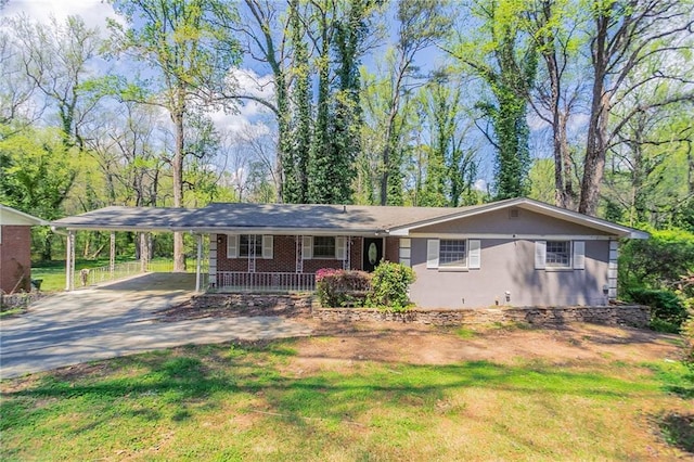 1753 Dodson Dr SW, Atlanta, GA 30311 - view of front of property featuring a carport, driveway, and a front yard