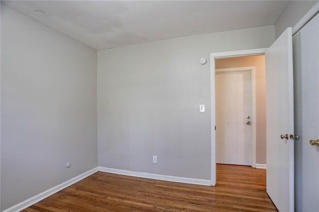 1753 Dodson Dr SW, Atlanta, GA 30311 - unfurnished room with baseboards and wood finished floors