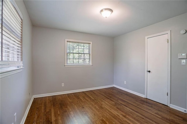 1753 Dodson Dr SW, Atlanta, GA 30311 - unfurnished room featuring baseboards and dark wood finished floors