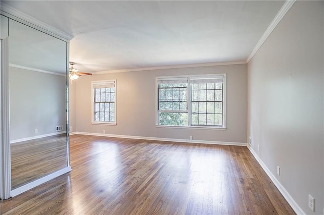 1753 Dodson Dr SW, Atlanta, GA 30311 - unfurnished room featuring crown molding, baseboards, and wood finished floors
