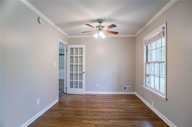 1753 Dodson Dr SW, Atlanta, GA 30311 - spare room with dark wood-type flooring, visible vents, a ceiling fan, and a healthy amount of sunlight