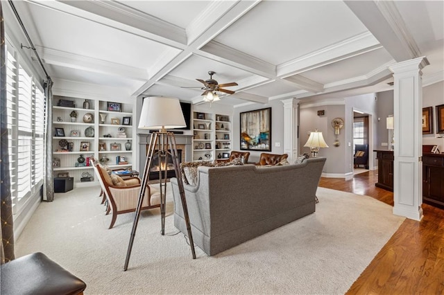4492 Arbor Crest Ct, Suwanee, GA 30024 - living room featuring decorative columns, healthy amount of natural light, wood finished floors, ornamental molding, and beamed ceiling