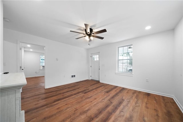 entrance foyer with ceiling fan and dark hardwood / wood-style floors