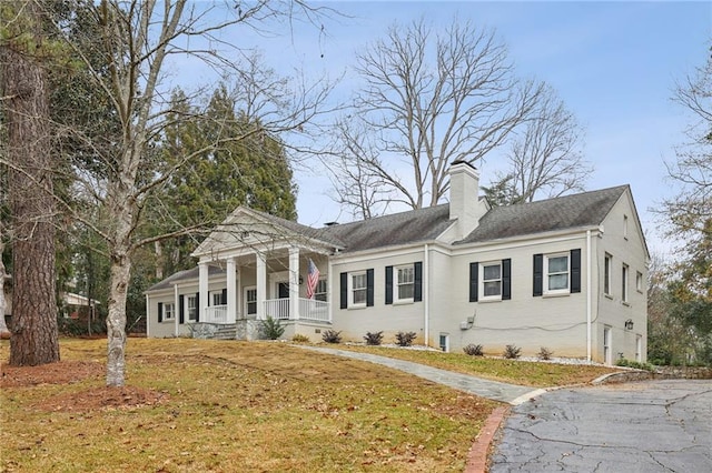 neoclassical home with a porch