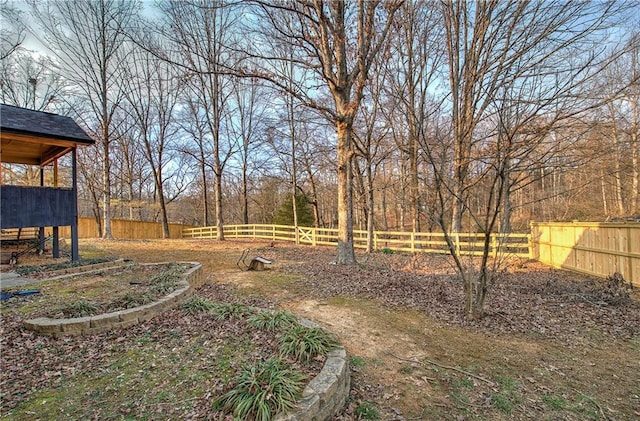 view of yard with a fenced backyard