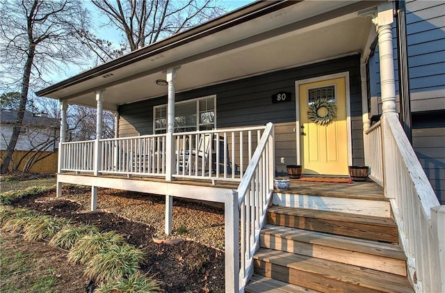 property entrance with a porch