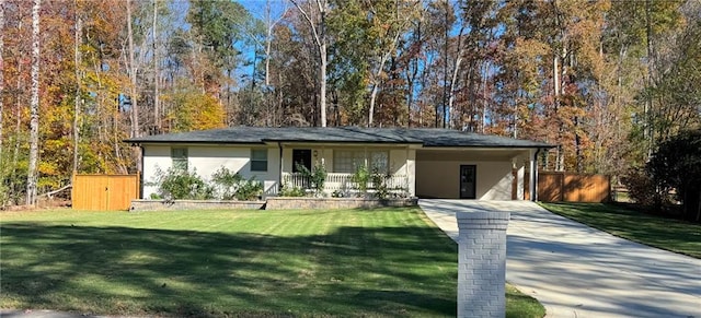 ranch-style home with a front lawn and a carport