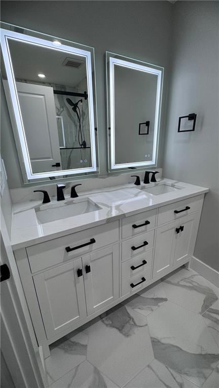 bathroom featuring vanity and walk in shower