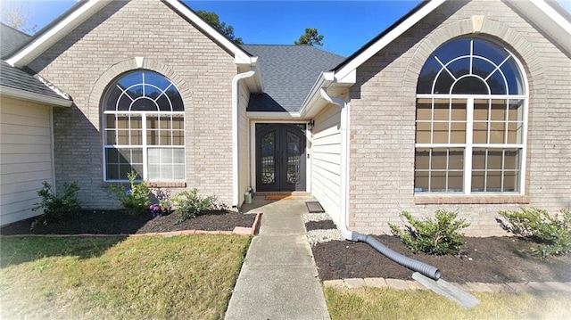 doorway to property featuring french doors