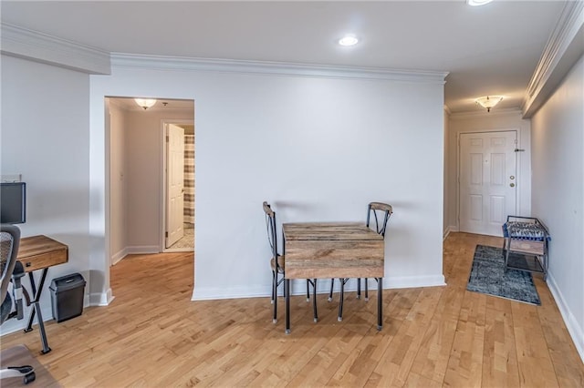 dining room featuring recessed lighting, baseboards, light wood-style floors, and ornamental molding