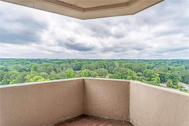 balcony with a wooded view