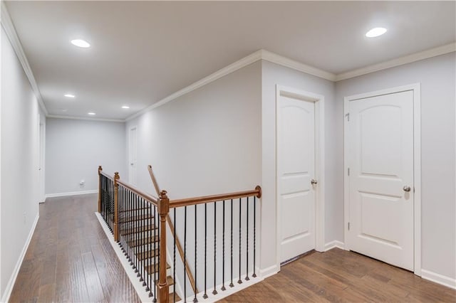 4240 Summer Breeze Way, Buford, GA 30518 - hallway featuring an upstairs landing, wood finished floors, ornamental molding, recessed lighting, and baseboards