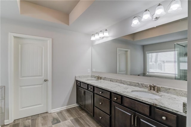 4240 Summer Breeze Way, Buford, GA 30518 - bathroom with double vanity and baseboards