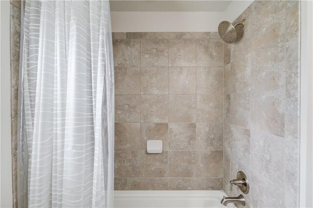 4240 Summer Breeze Way, Buford, GA 30518 - bathroom featuring shower / tub combo with curtain