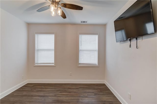 4240 Summer Breeze Way, Buford, GA 30518 - unfurnished room featuring dark wood-style floors, ceiling fan, and baseboards