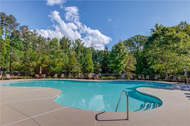 4240 Summer Breeze Way, Buford, GA 30518 - community pool featuring fence, a patio area, and view of scattered trees