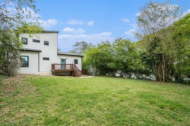 view of yard featuring a deck