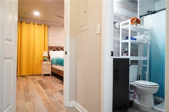 1452 Mercer Ave, Atlanta, GA 30337 - bathroom with wood finished floors, electric panel, and ensuite bath