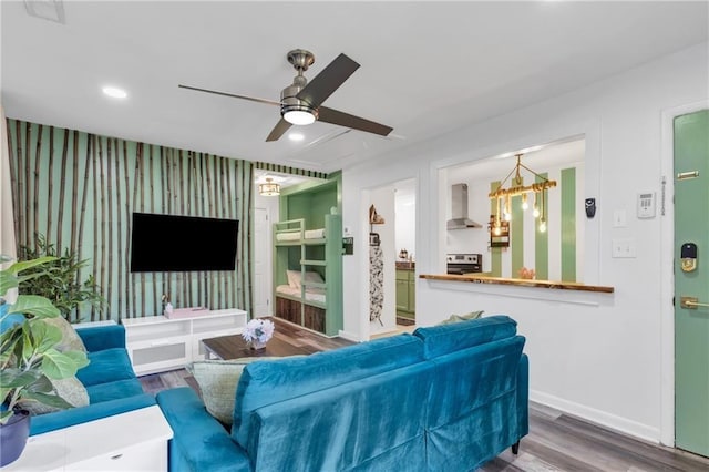 1452 Mercer Ave, Atlanta, GA 30337 - living room with wood finished floors, ceiling fan, a chandelier, recessed lighting, and wallpapered walls