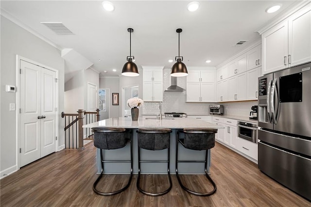 234 Retreat Ln, Canton, GA 30114 - kitchen with stainless steel appliances, wall chimney range hood, white cabinetry, backsplash, and ornamental molding