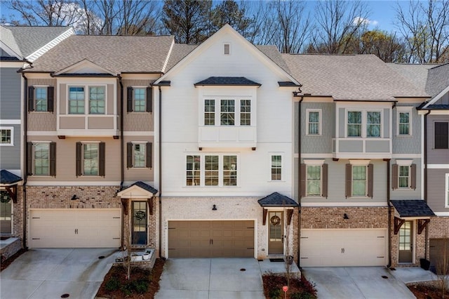234 Retreat Ln, Canton, GA 30114 - multi unit property with an attached garage, driveway, and brick siding