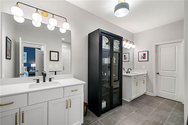 234 Retreat Ln, Canton, GA 30114 - bathroom featuring two vanities and connected bathroom