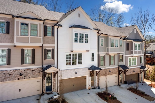234 Retreat Ln, Canton, GA 30114 - view of property with an attached garage, driveway, brick siding, and roof with shingles