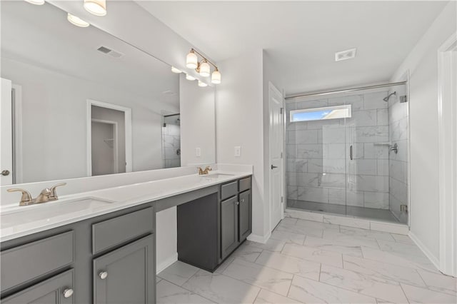 bathroom featuring walk in shower and vanity