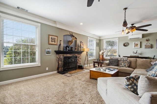 carpeted living area with a fireplace, an AC wall unit, a ceiling fan, baseboards, and visible vents