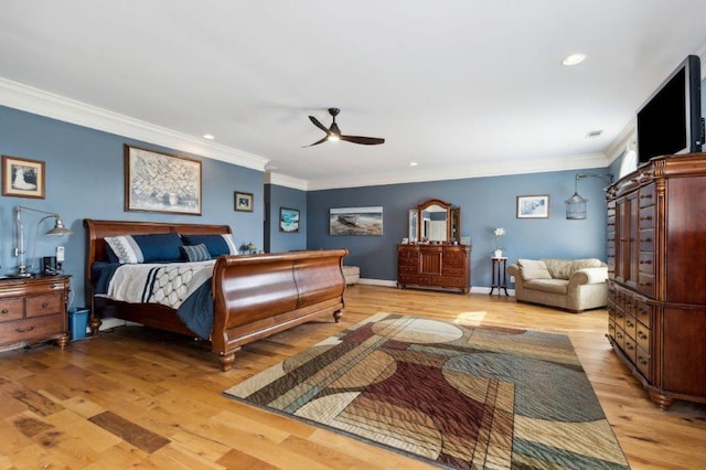 bedroom with recessed lighting, ornamental molding, light wood-style flooring, and baseboards